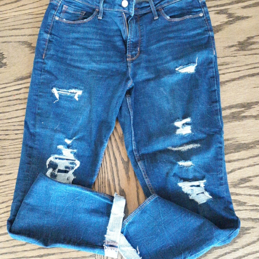 Womens distressed jeans.